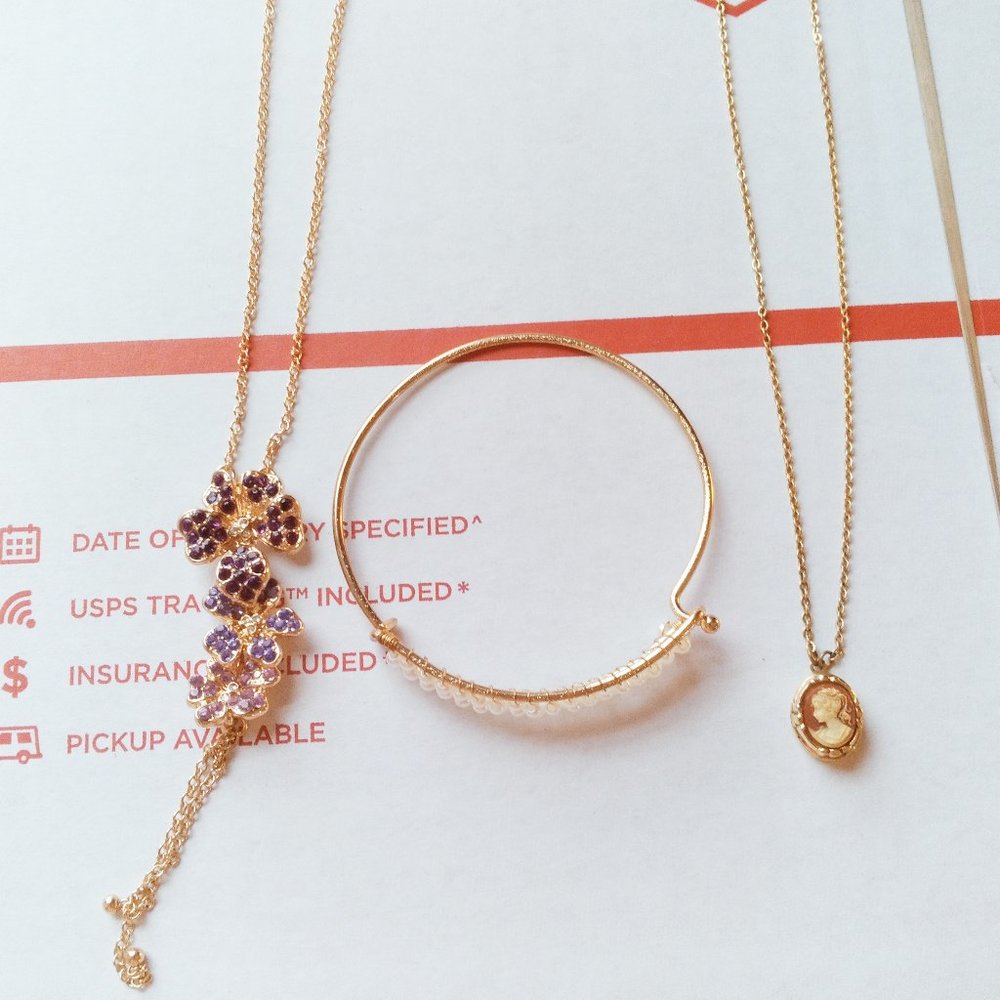 Gold colored jewelry necklace + branchlet